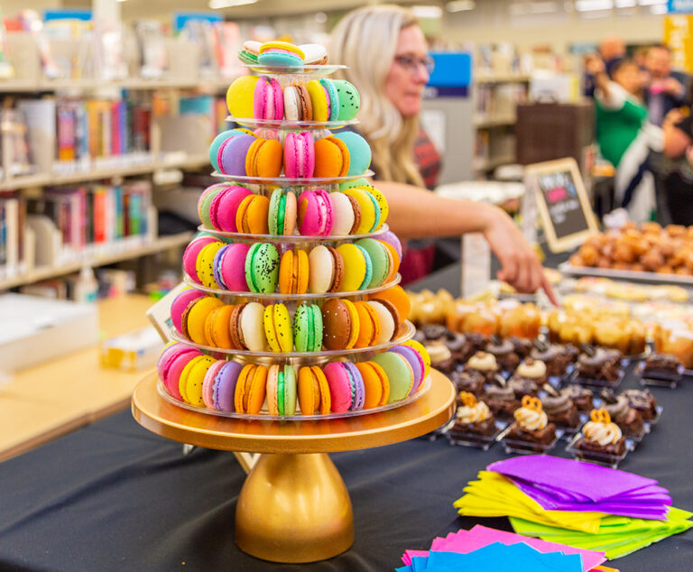 Tray of colorful macarons at Library Lets Loose